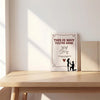 A white book with a title This is why you're mine and illustrations of a couple on the cover.