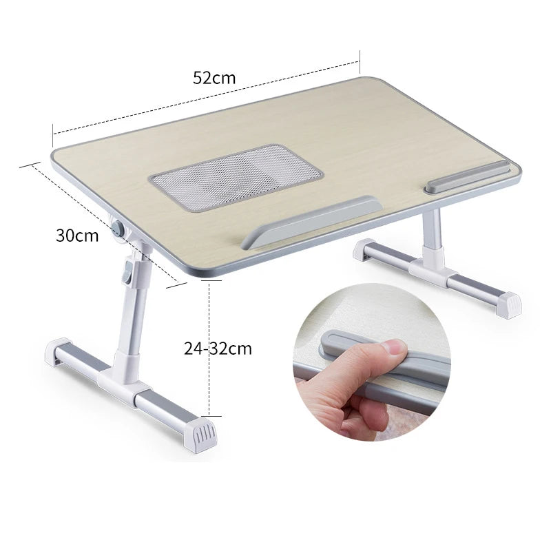 An adjustable foldable laptop desk with a light wood-colored surface and silver metal legs.