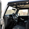 Interior view of a Jeep Wrangler showing non-slip roll bar grab handles installed on the door frame.