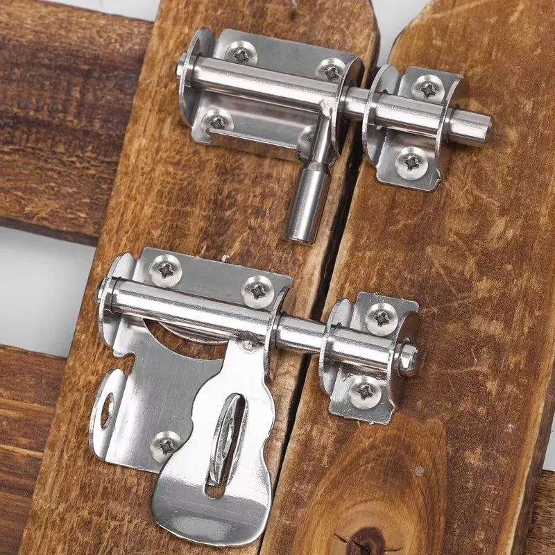 Heavy duty stainless steel door bolt latch mechanism mounted on a wooden surface.