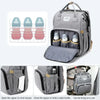 Gray backpack diaper bag with an interior changing mat and storage pockets