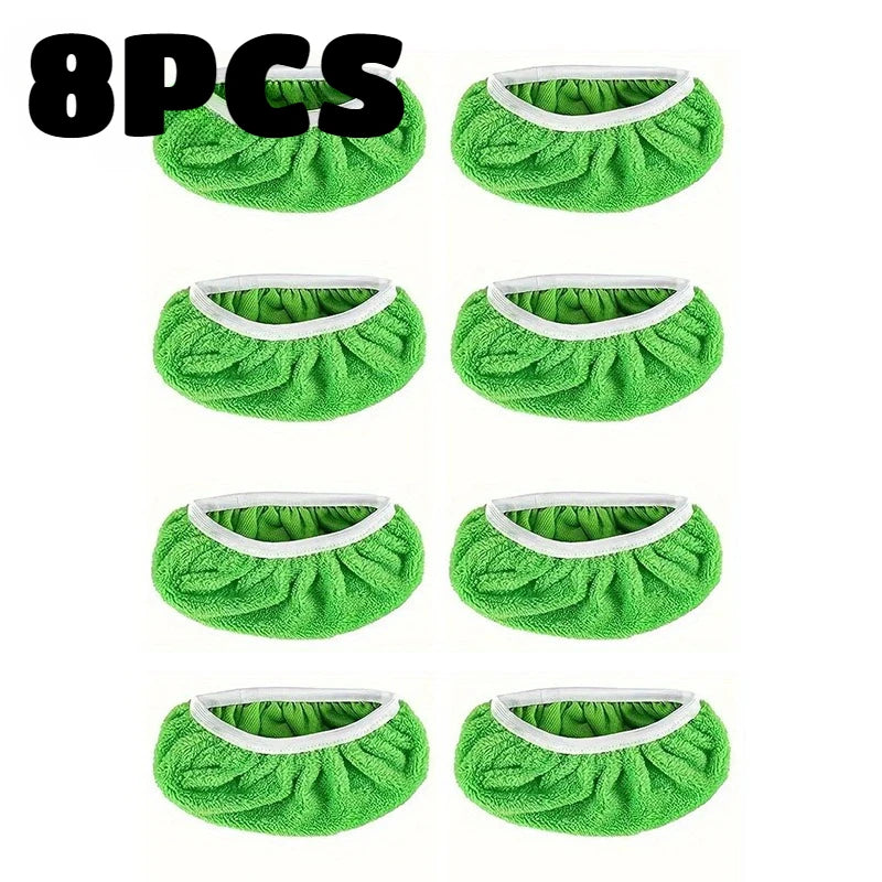 Eight reusable green microfiber mop refill pads in a circular shape.