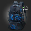 A dark blue travel backpack featuring an outer camouflage pattern, equipped with a laptop sleeve and a shoe compartment.