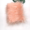 A fluffy pink faux fur fabric used for DIY sewing, doll hair, or cosplay.