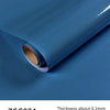 Blue glitter peel-and-stick vinyl contact paper rolled up showing its thickness and color