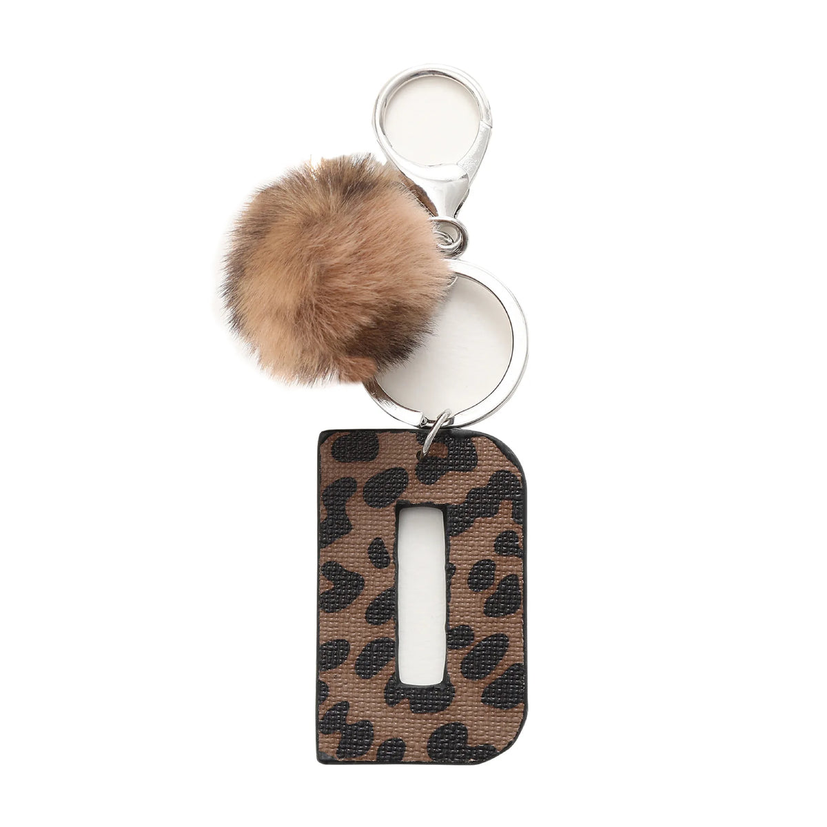 A leopard print letter keychain featuring a dark brown and black pattern and a fluffy brown pom-pom.