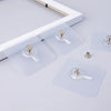 Transparent self-adhesive hooks for wall mounting shown in various sizes and angles