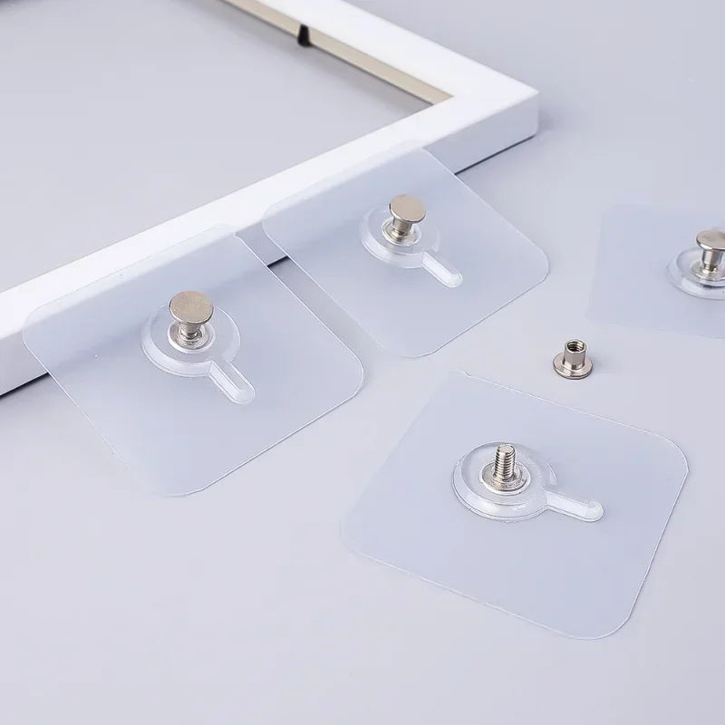 Transparent self-adhesive hooks for wall mounting shown in various sizes and angles