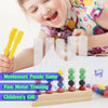 A young girl is using a Montessori puzzle game featuring wooden beads and test tubes for fine motor training.