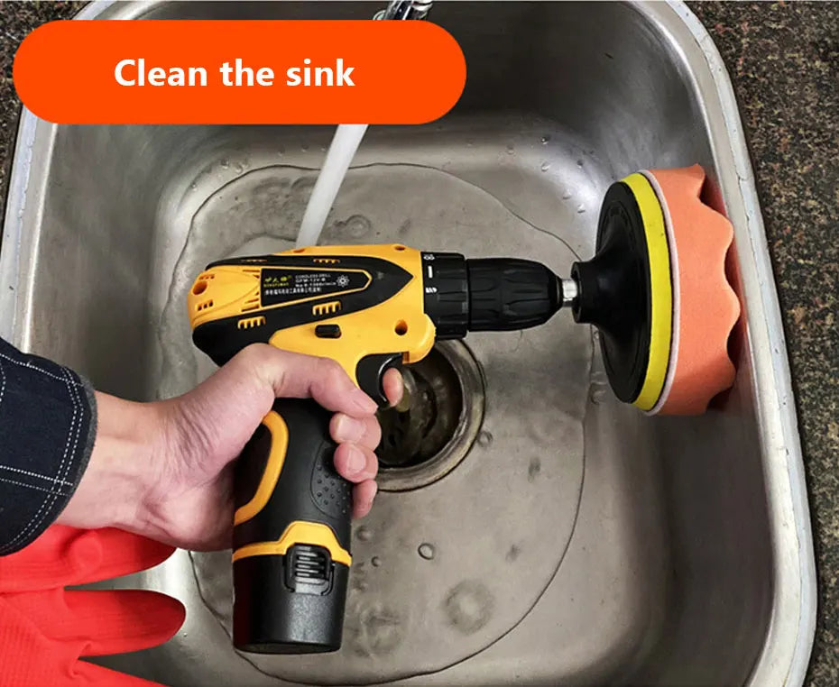 A hand uses a yellow electric tool to clean a kitchen sink, with a cleaning instruction overlay visible.
