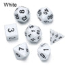 A set of white polyhedral dice including a d10, d8, d6, and d4, displayed on a white background.