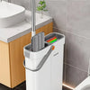 A white ultra-narrow flat mop and bucket set with a power roller is shown next to a sink and toilet.