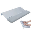 An ergonomic acrylic keyboard stand with a memory foam wrist rest is shown next to a hand typing on the keyboard.