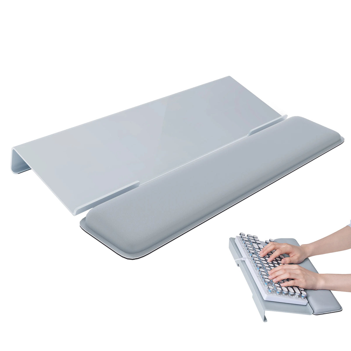 An ergonomic acrylic keyboard stand with a memory foam wrist rest is shown next to a hand typing on the keyboard.
