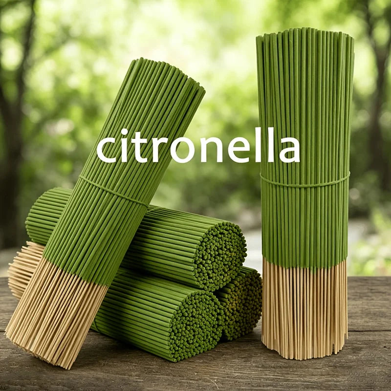 Green citronella incense sticks bundled in natural bamboo, ready for burning.