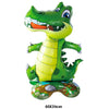 A bright green foil balloon shaped like a dinosaur with large eyes and an open mouth.