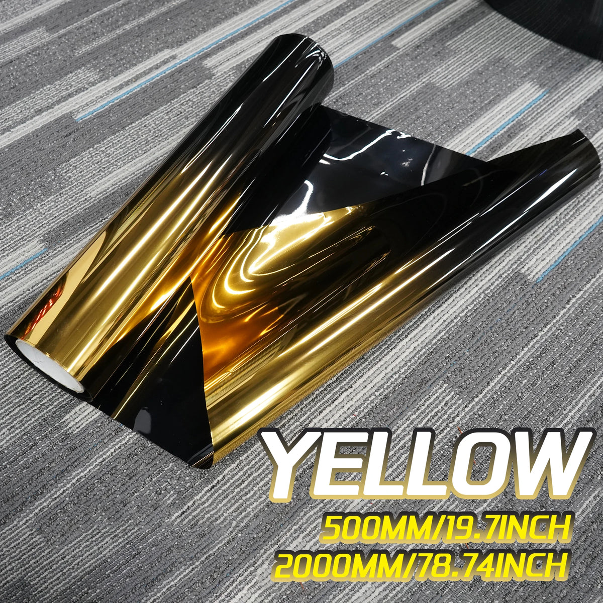 A roll of yellow gradient car window tint film shown against a gray background.
