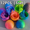A collection of twelve colorful 3D printed dragon and egg sculptures in various shades of blue, green, and pink.