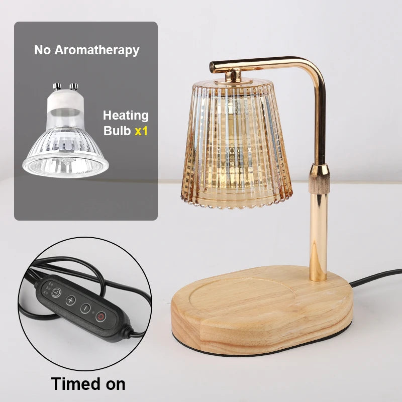 A brass candle warmer lamp with a glass shade and wooden base, shown next to instructions for use.