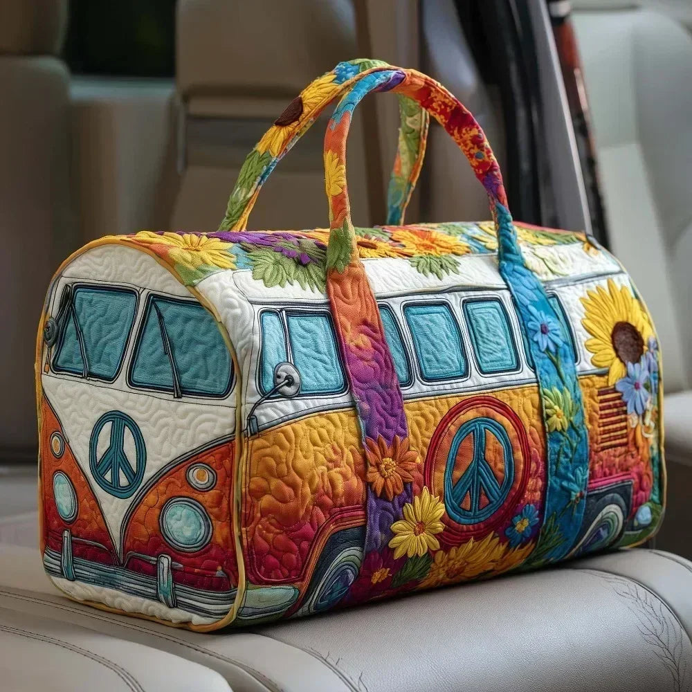 A colorful quilted travel duffle bag featuring a stylized car design with vibrant floral and peace sign stitching.