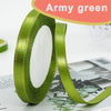 Army green satin ribbon rolled on and unrolled, showing the fabric texture and gold edge.