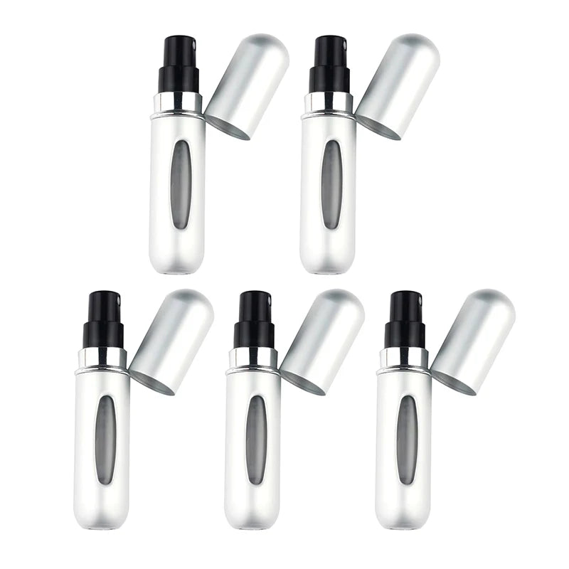 A set of five silver and black travel-friendly refillable perfume spray bottles shown from the side.