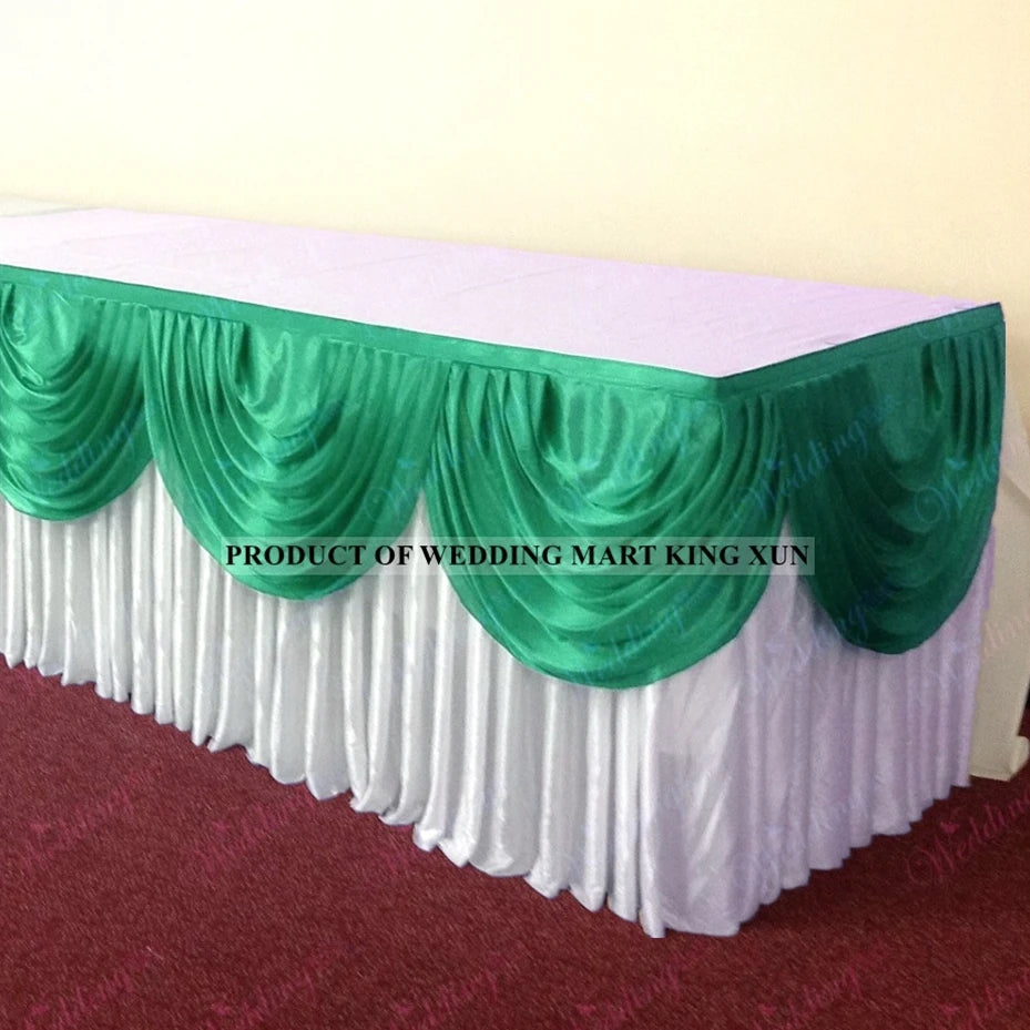 Elegant ice silk table skirt with matching top swag in green and white.