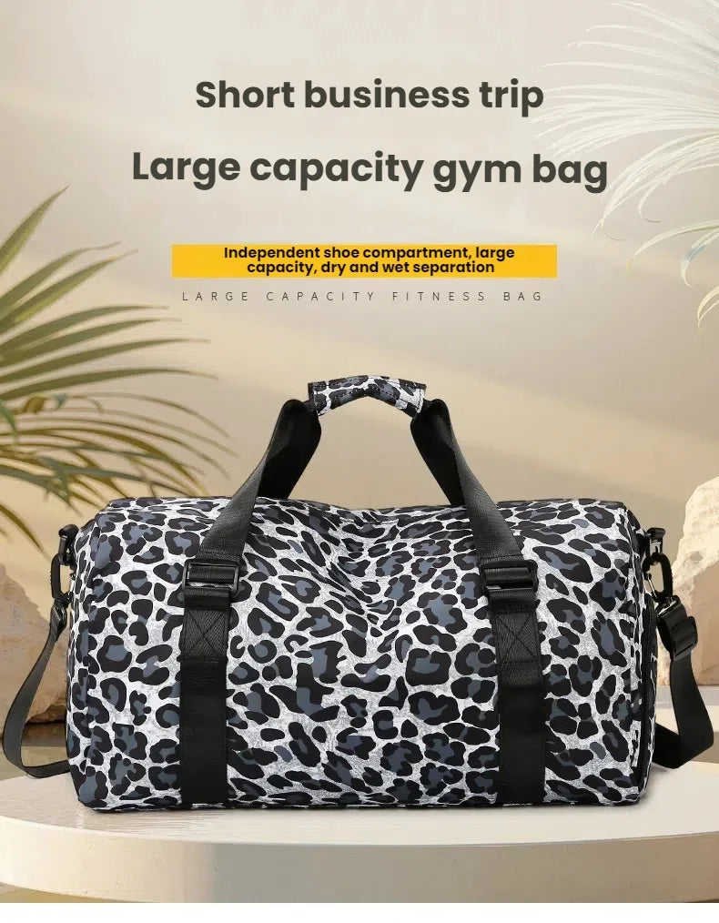 A leopard print gym bag with an independent shoe compartment shown against a light background.