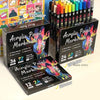 A collection of Dual-Tip Acrylic Paint Markers in various colors displayed in packaging boxes.