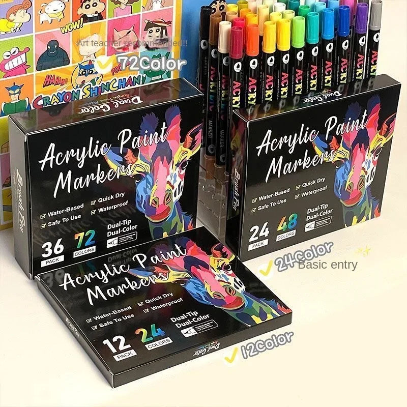 A collection of Dual-Tip Acrylic Paint Markers in various colors displayed in packaging boxes.