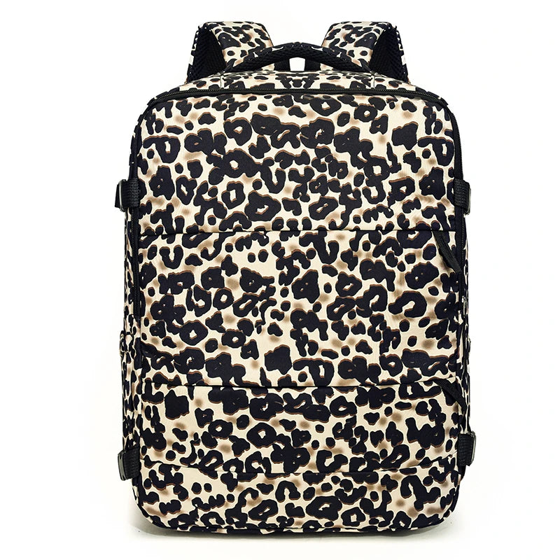 A black and tan leopard print travel and commuter backpack.