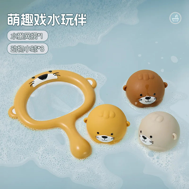 A set of floating bath toys featuring a yellow turtle ring, a brown bear, and a beige bear, shown in water.