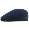 Navy blue breathable mesh newsboy cap shown from the side.