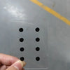 A hand is placing smooth glass mouse skates onto a clear plastic sheet for use with gaming or office mice.