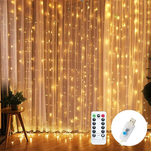 USB fairy string lights with remote control showing warm glowing lights draped across a curtain.