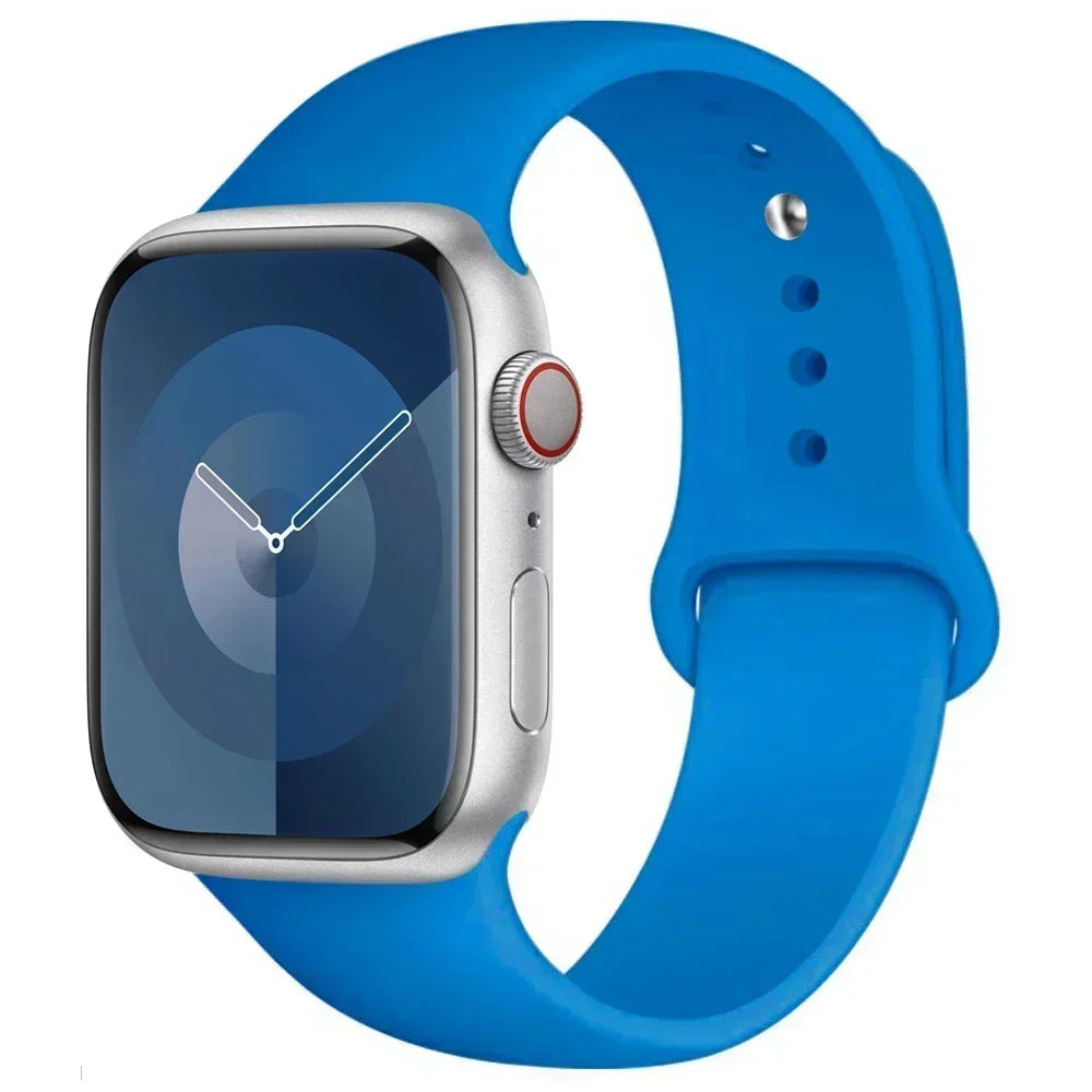 A blue silicone sport band worn around an Apple Watch.