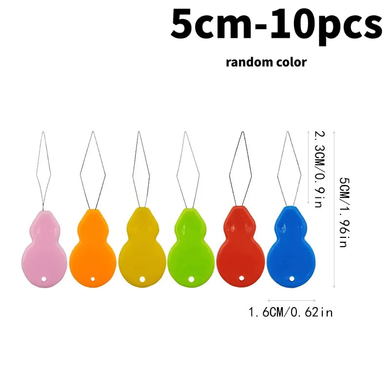 A set of 10 plastic needle threaders in various random colors, measuring 5cm to 10pcs.