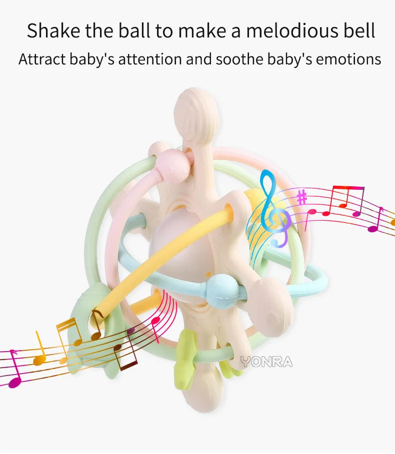 A silicone sensory rattle ball with colorful rings and musical notes, designed to soothe a baby's emotions.