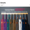 A row of professional chef aprons in various colors hanging on a wooden rack.