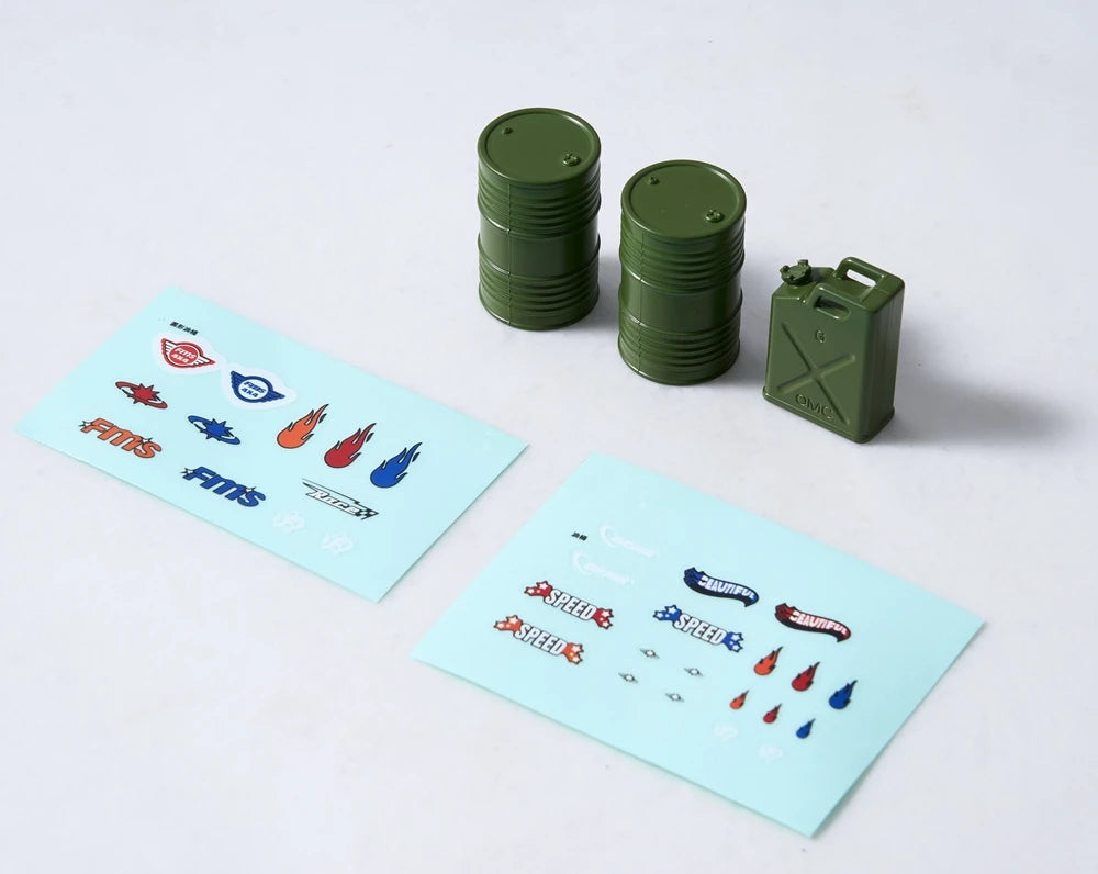 A set of green RC car decorative accessories including surfboard, kayak, and roadblocks.