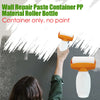 A hand is using a wall repair paste container roller bottle to apply material to a wall surface.