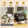 A black 2-tier kitchen countertop drying rack with a drip tray, showing organized dishes and utensils.
