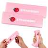 Pink squishy strawberry shaped butter fidget toy being held by hands