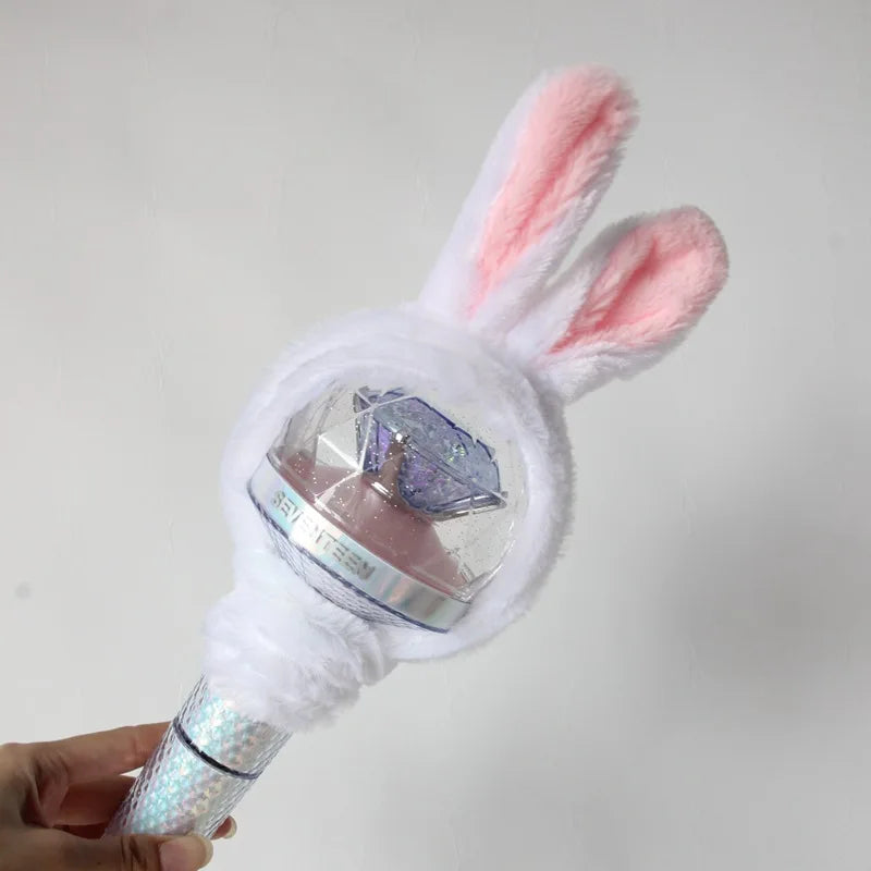 A plush cover with pink ears and a clear dome is shown, designed for a SEVENTEEN official light stick.