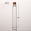 A clear glass bottle with a cork stopper, measuring 30mm in height and 22mm at the base.