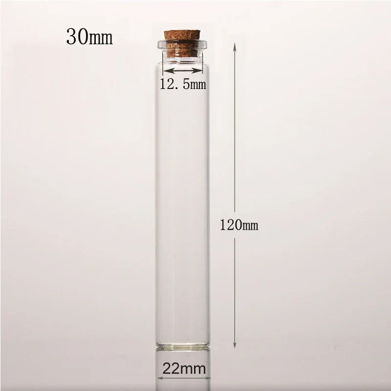 A clear glass bottle with a cork stopper, measuring 30mm in height and 22mm at the base.