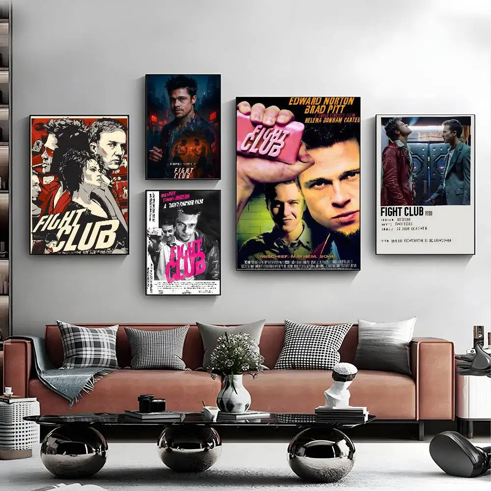 A collection of movie posters featuring the Fight Club theme displayed on a white wall above a brown sofa.