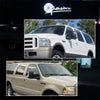 A white Ford Super Duty truck with amber LED side mirror turn signal lights installed.