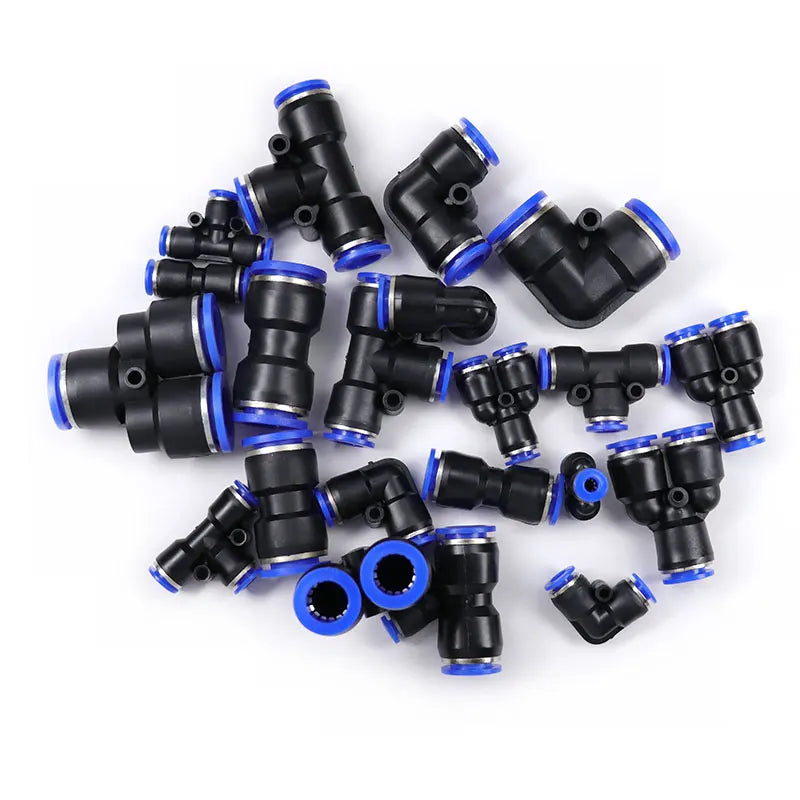 A collection of black pneumatic quick push-in fittings with blue accents for air compressor tubing.