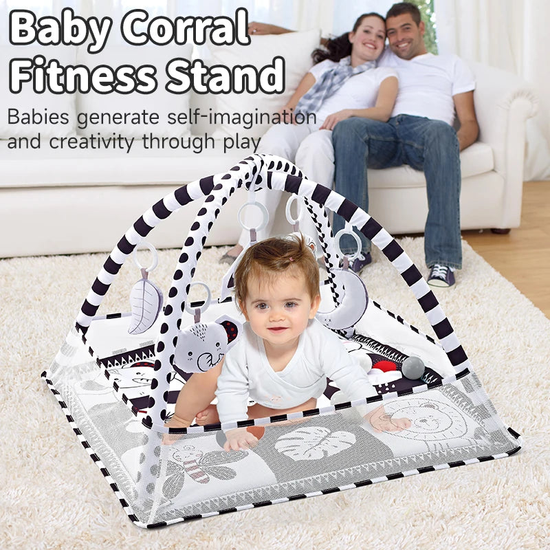 A baby corral fitness stand featuring a play gym mat with hanging toys for self-imagination and creativity.